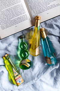 Group of colorful little bottles with liqueurs thumbnail