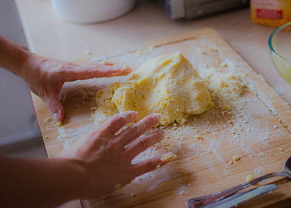 person kneading dough thumbnail