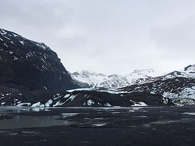 photography of snow capped mountain during daytime thumbnail