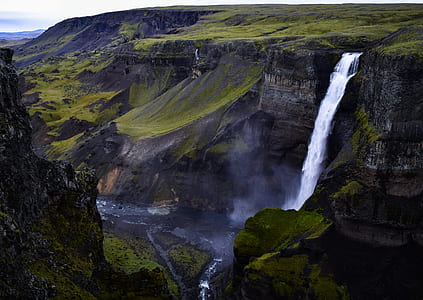 waterfalls in gray and green mountain thumbnail
