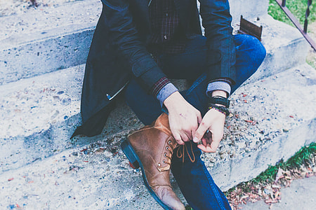 person tying shoe lace thumbnail