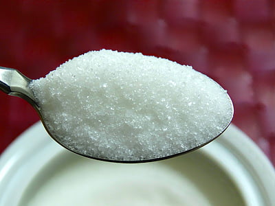 spoon with white sugar thumbnail
