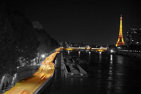 selective focus photography of yellow road towards Eiffel Tower thumbnail