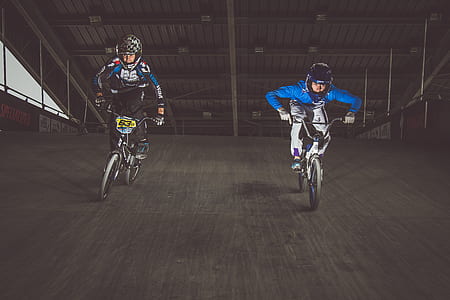 two man riding BMX bicycles thumbnail