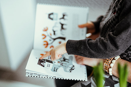 Child reading a book thumbnail