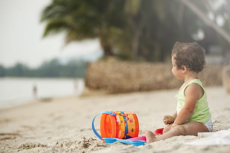 Baby Wearing Green Tank Top thumbnail