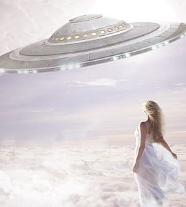 woman wearing dress looking at round spaceship painting thumbnail