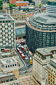 aerial photo of cars between buildings thumbnail