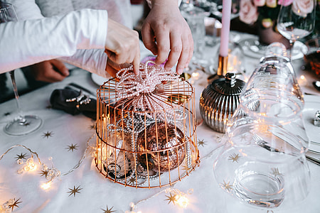 Hands Decorating Christmas Table thumbnail