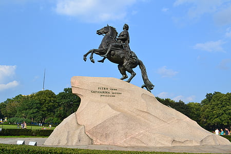 man riding horse statue under blue cloudy sky thumbnail