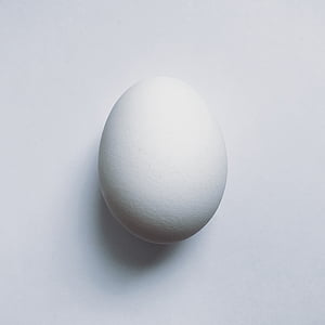 white egg on white platform thumbnail