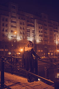 woman standing on bridge thumbnail