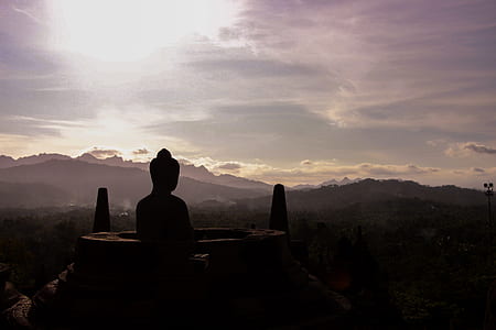 silhouette photography of buddha thumbnail