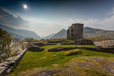 landscape photography of building near mountains thumbnail