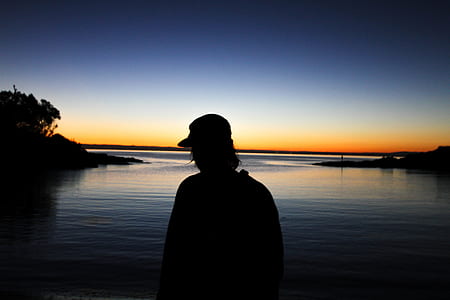 man near body of water thumbnail