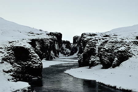 river between two hills during winter thumbnail