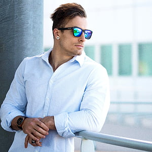 man in black framed sunglasses and white dress shirt thumbnail
