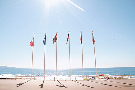 six assorted-color flags in pole thumbnail