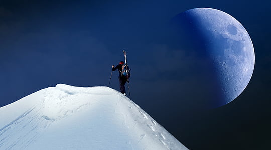 person climbing on snowy mountain thumbnail
