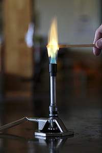 Barium solution burning on a wooden splint in a bunsen burner flame. thumbnail