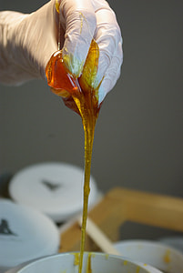 person holding brown slime thumbnail