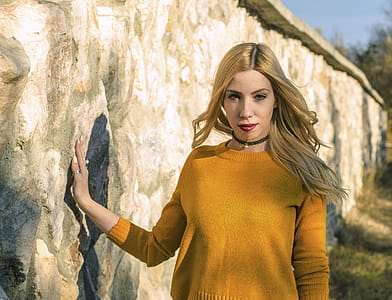 Woman In Yellow Crew-neck Sweatshirt thumbnail