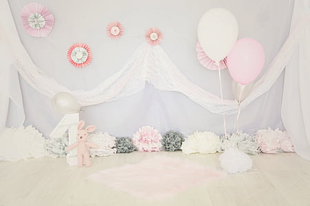 pink and white flower arrangement and balloons thumbnail
