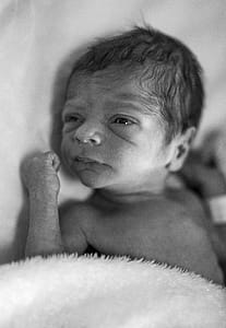 Grayscale Photo of Newborn Baby thumbnail