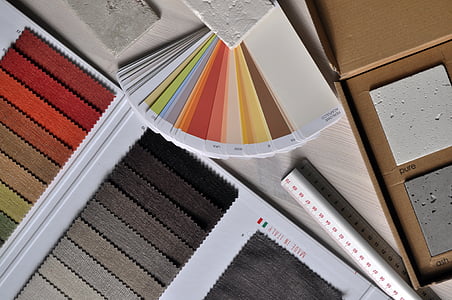 multicolored paper on white table thumbnail