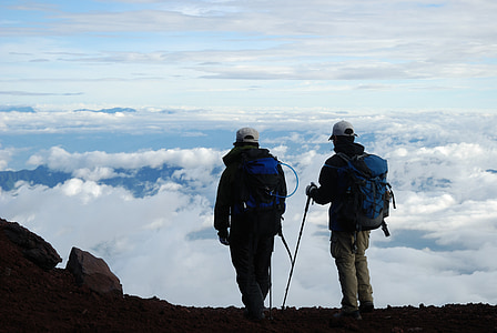 men standing on mountain thumbnail