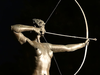 person holding bow and arrow statue thumbnail
