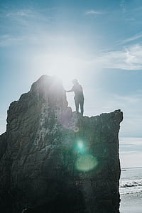 person on top of mountain thumbnail