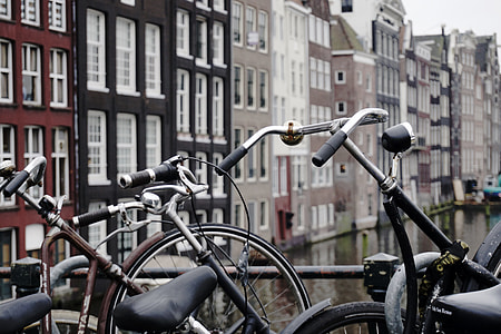 two city bicycle on bridge railings thumbnail