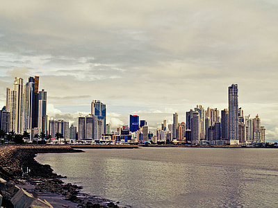 person taking photo of city thumbnail