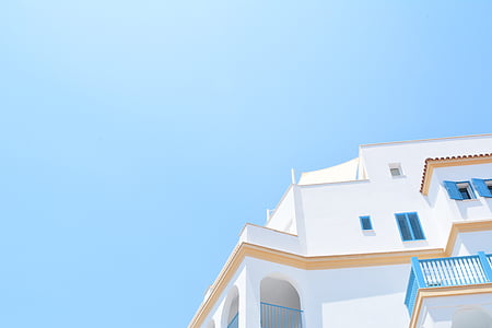 high-rise white and blue building at daytime thumbnail