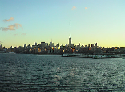 buildings beside calm body of water thumbnail