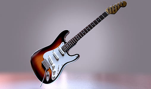 photo of brown stratocaster-style electric guitar thumbnail