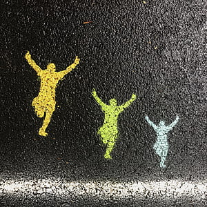 three running people silhouette painted on black surface thumbnail