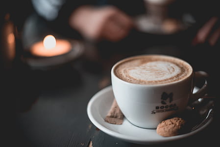 white ceramic teacup set with latte thumbnail