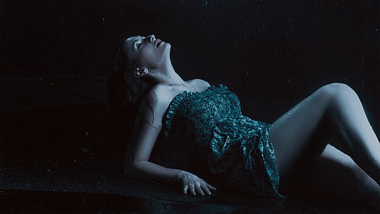 woman wearing gray tube dress while lying down thumbnail