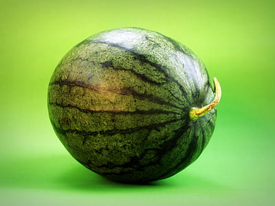 green watermelon on green surface thumbnail