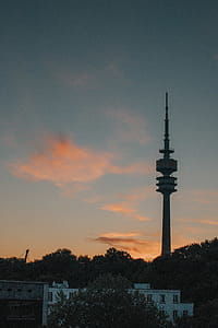 Silhouette Photo of Tower Near Forest thumbnail