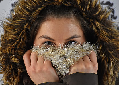 woman wearing brown and black parka jacket thumbnail