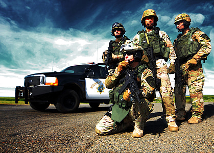 four male soldiers near vehicle thumbnail