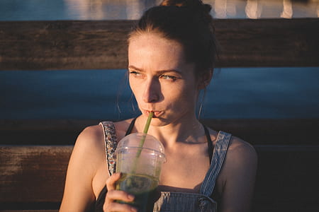 woman sipping dessert thumbnail