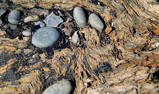several stones on wood thumbnail