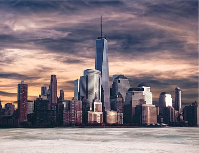 photography of cityscape near body of water thumbnail