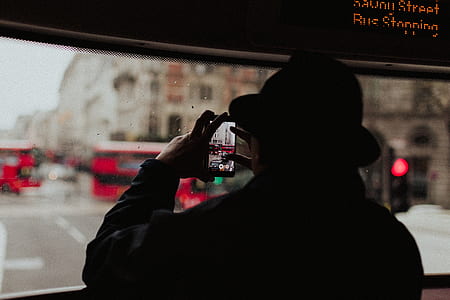 person taking a photo using smartphone thumbnail