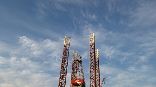 low rise photo of a four brown metal stands thumbnail