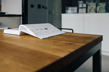 Tap catalogue on a wooden table thumbnail